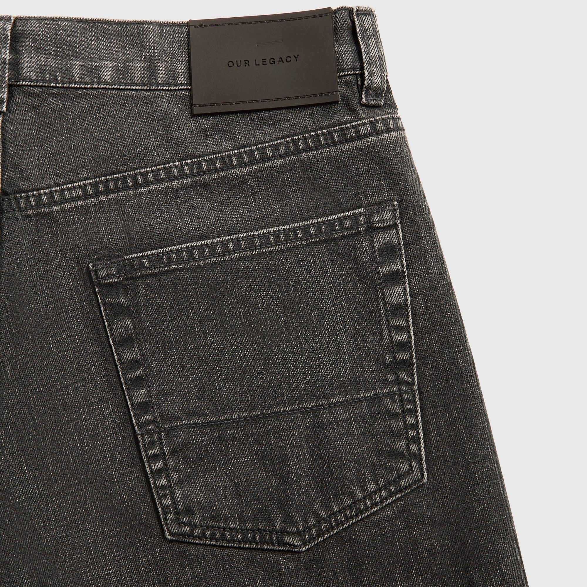 Our Legacy Third Cut Denim - Black Coated Wash Dynamic Motion