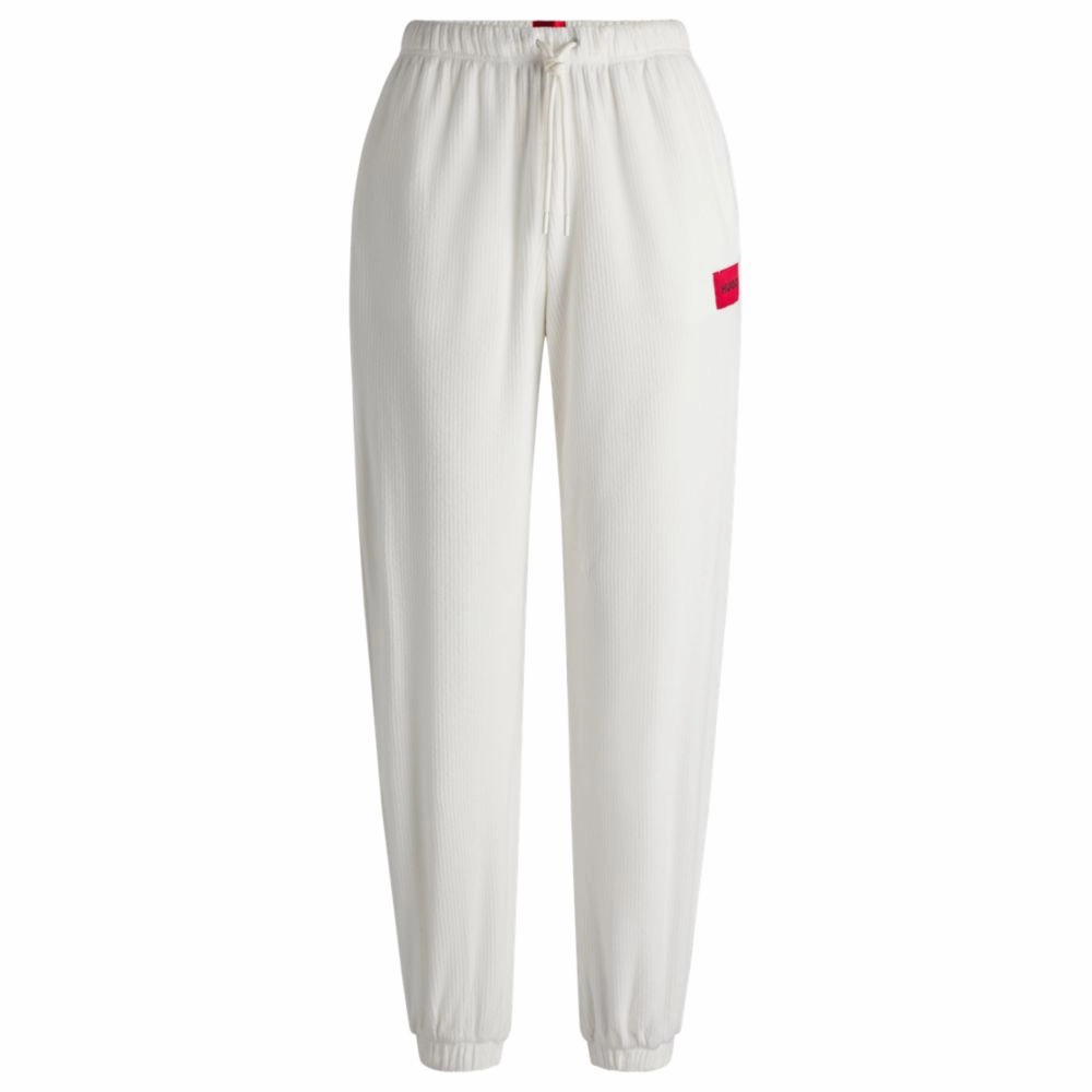 Tracksuit bottoms with red logo label OdorResistant Technology