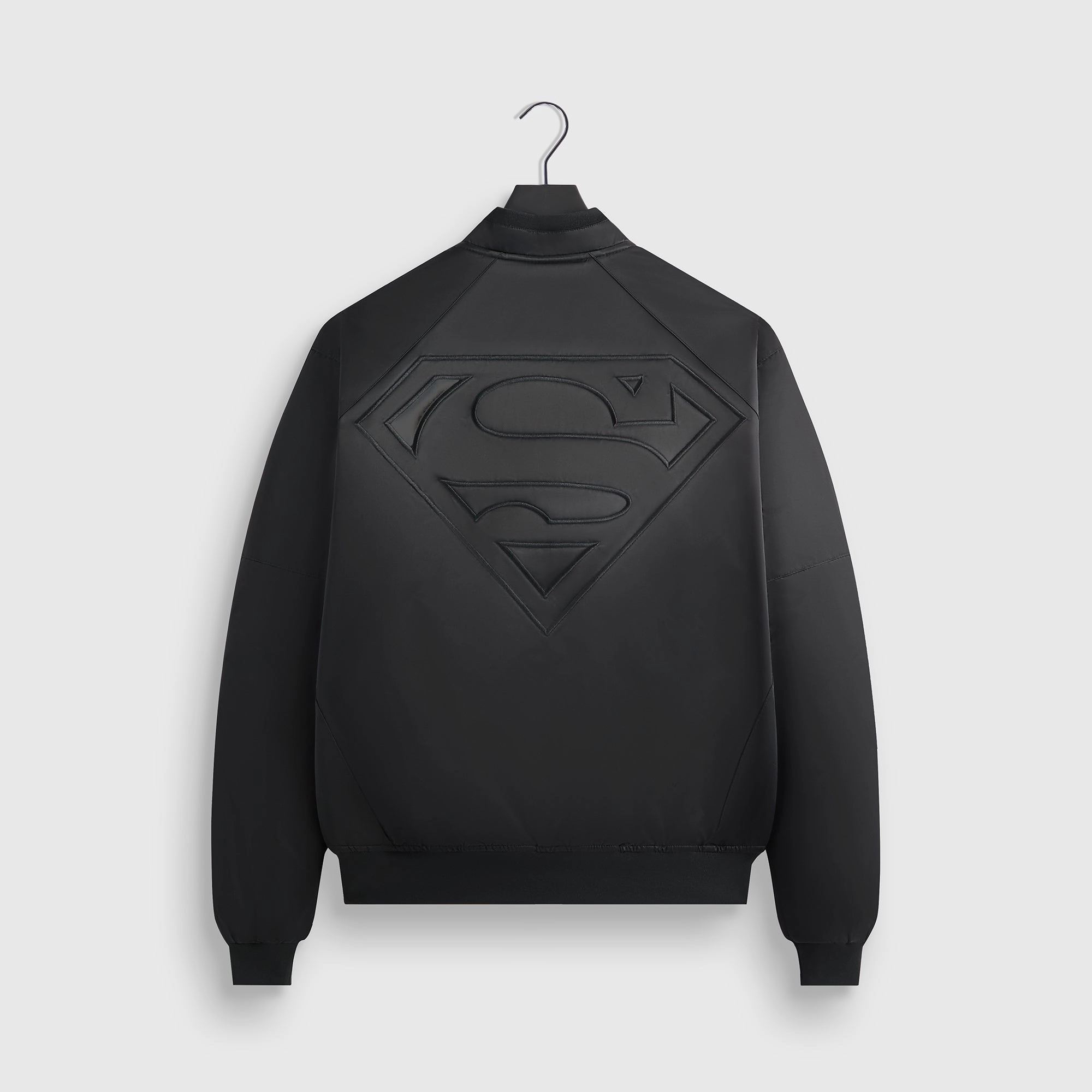 Magnetic Fasteners Reinforced Shoulder Protection Superman | Kith Satin Bomber Jacket - Black
